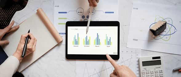 Team reviewing analytics and growth metrics